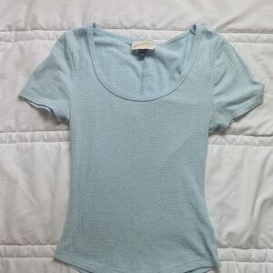 light blue woman’s top